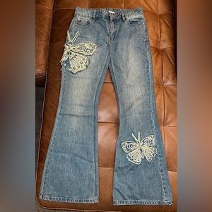 Urban Outfitters // Low Rise Flared butterfly appliqué jeans - from BDG. Size 25